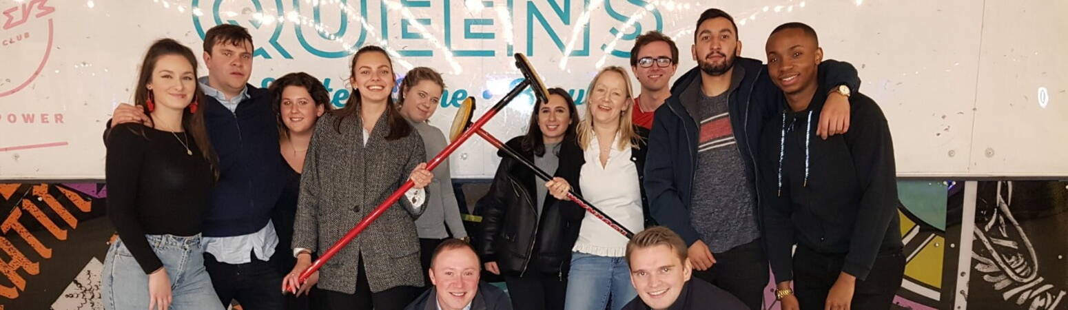 A group of young people who have been curling