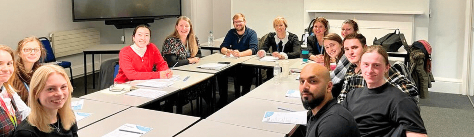 Students sat around table for employability skills session